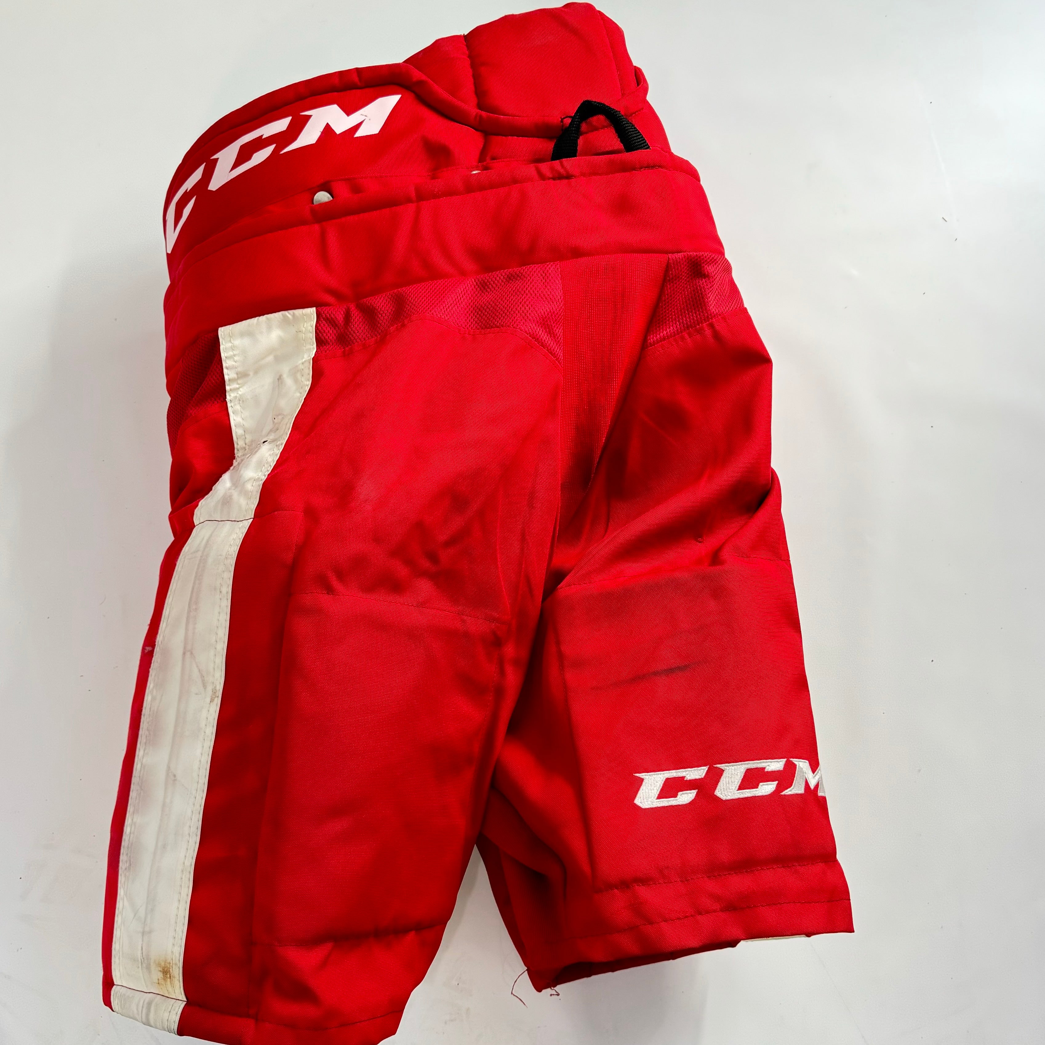 CCM HP31 - Pantalon de hockey Pro Stock d'occasion de la Ligue de hockey de l'Ontario (rouge/blanc)